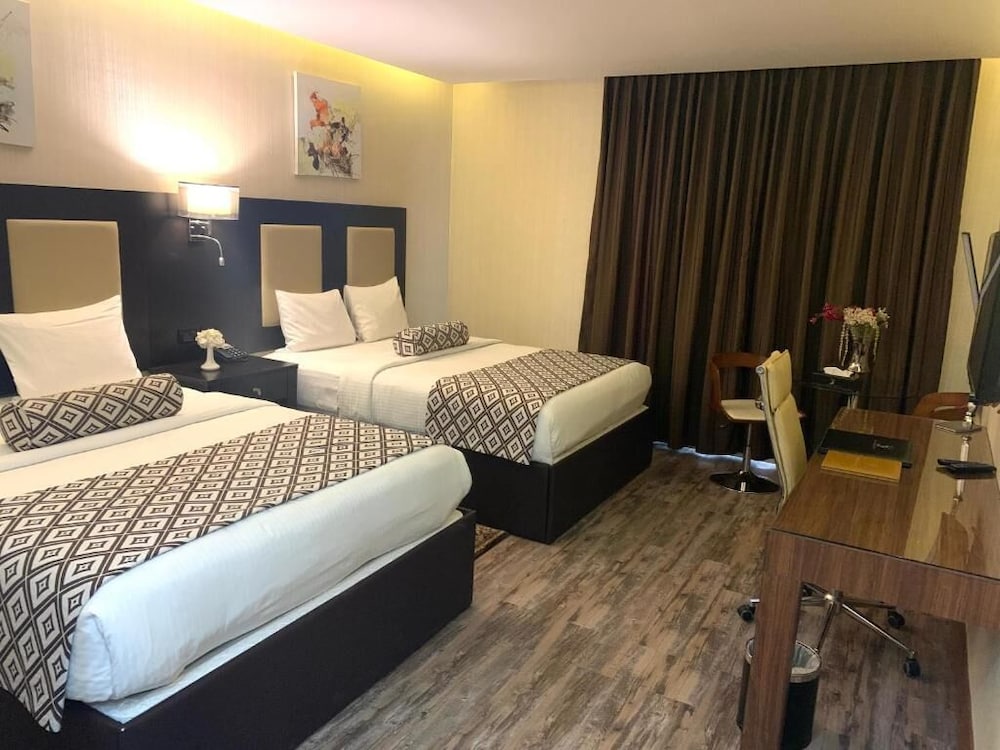 Deluxe Triple Room, City View