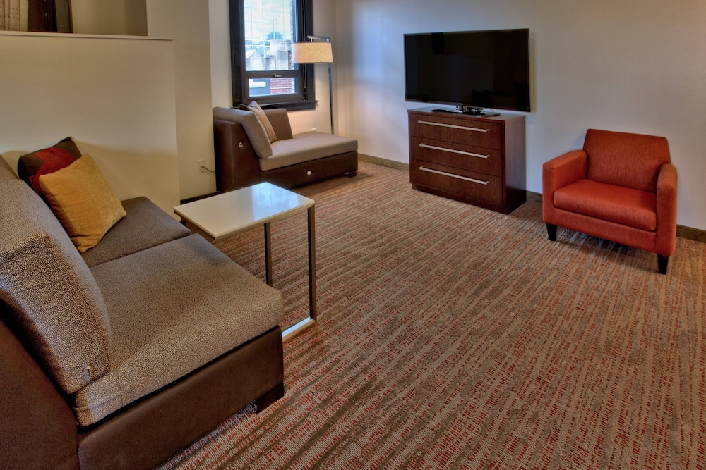 Suite, 1 King Bed with Sofa bed photo 1