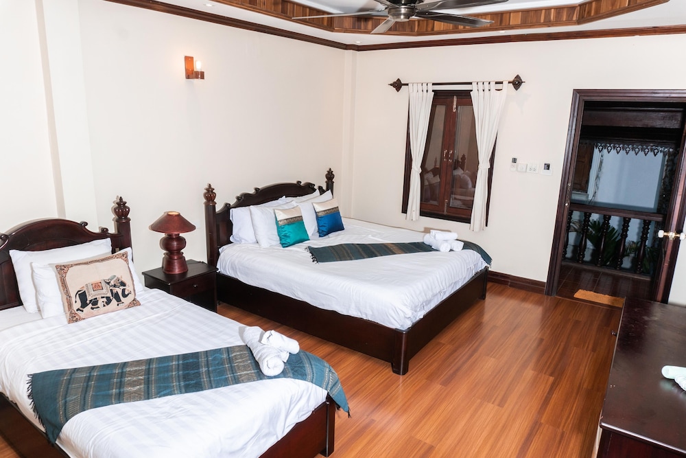 Deluxe Triple Room - Photo 2