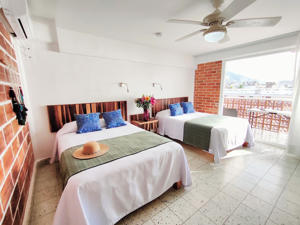 Standard Room, 2 Double Beds, Partial Ocean View - Photo 1