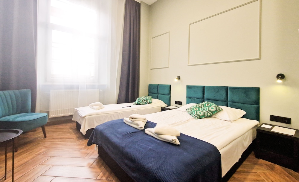 Deluxe Triple Room, Multiple Beds photo 1