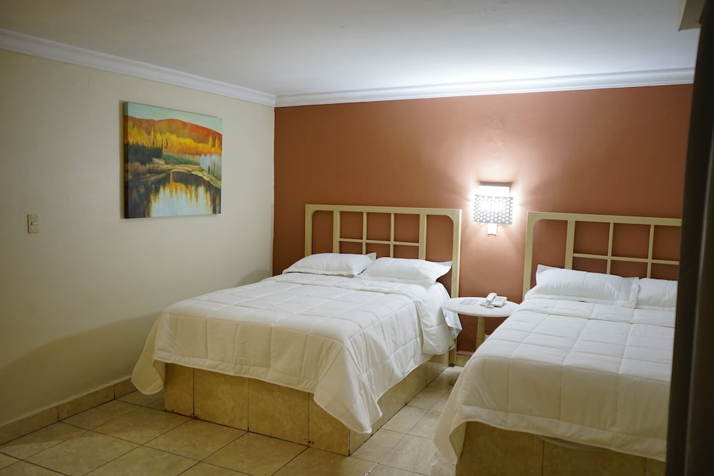 Deluxe Quadruple Room, 2 Double Beds (Master Suite) photo 2