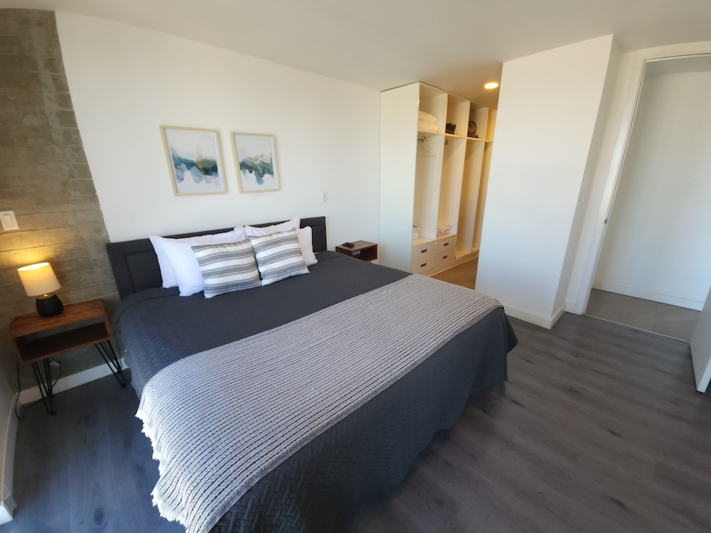 Deluxe Condo, Balcony, City View