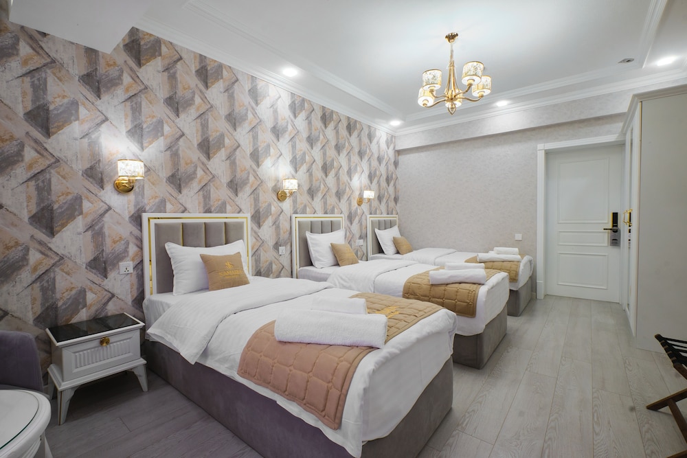 Deluxe Room, 3 Twin Beds photo 3