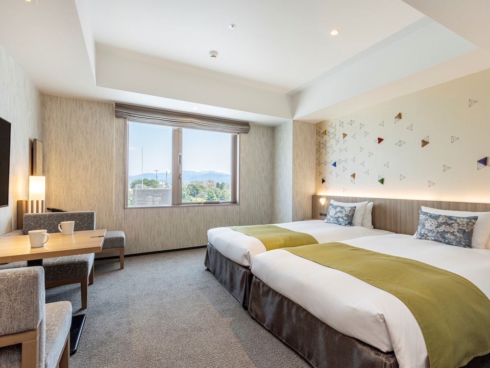Deluxe Twin Room, Single Use - Photo 1