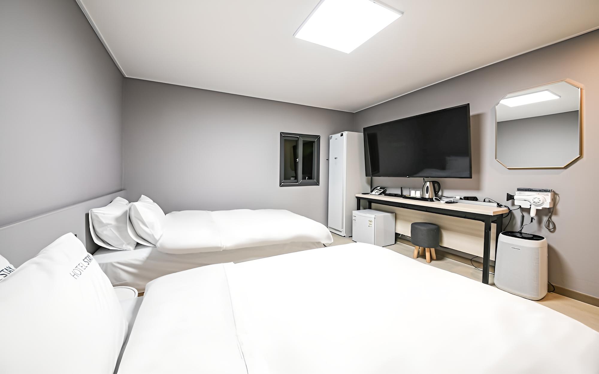 Room (Standard Twin (Duck Down Bedding) (4K) - Photo 2