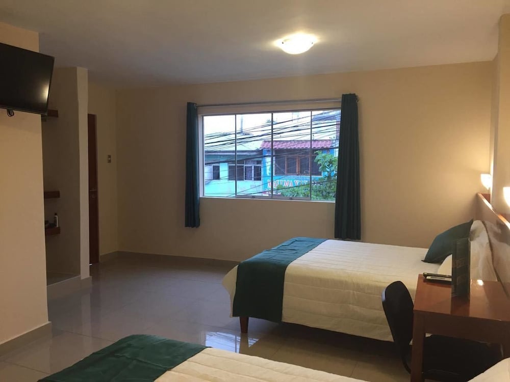 Family Room, 2 Double Beds, Air conditioning, City View photo 1