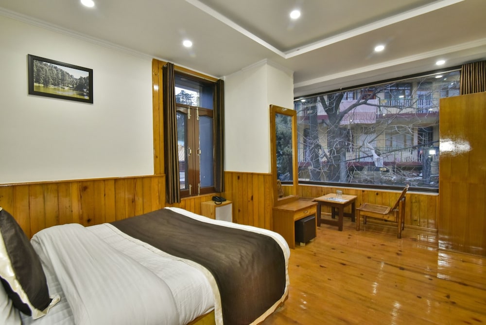 Deluxe Room - Photo 9