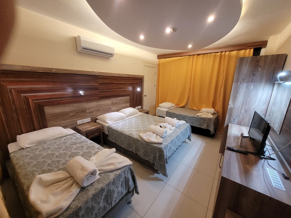 Family Quadruple Room, 1 Bedroom, Garden View photo 3