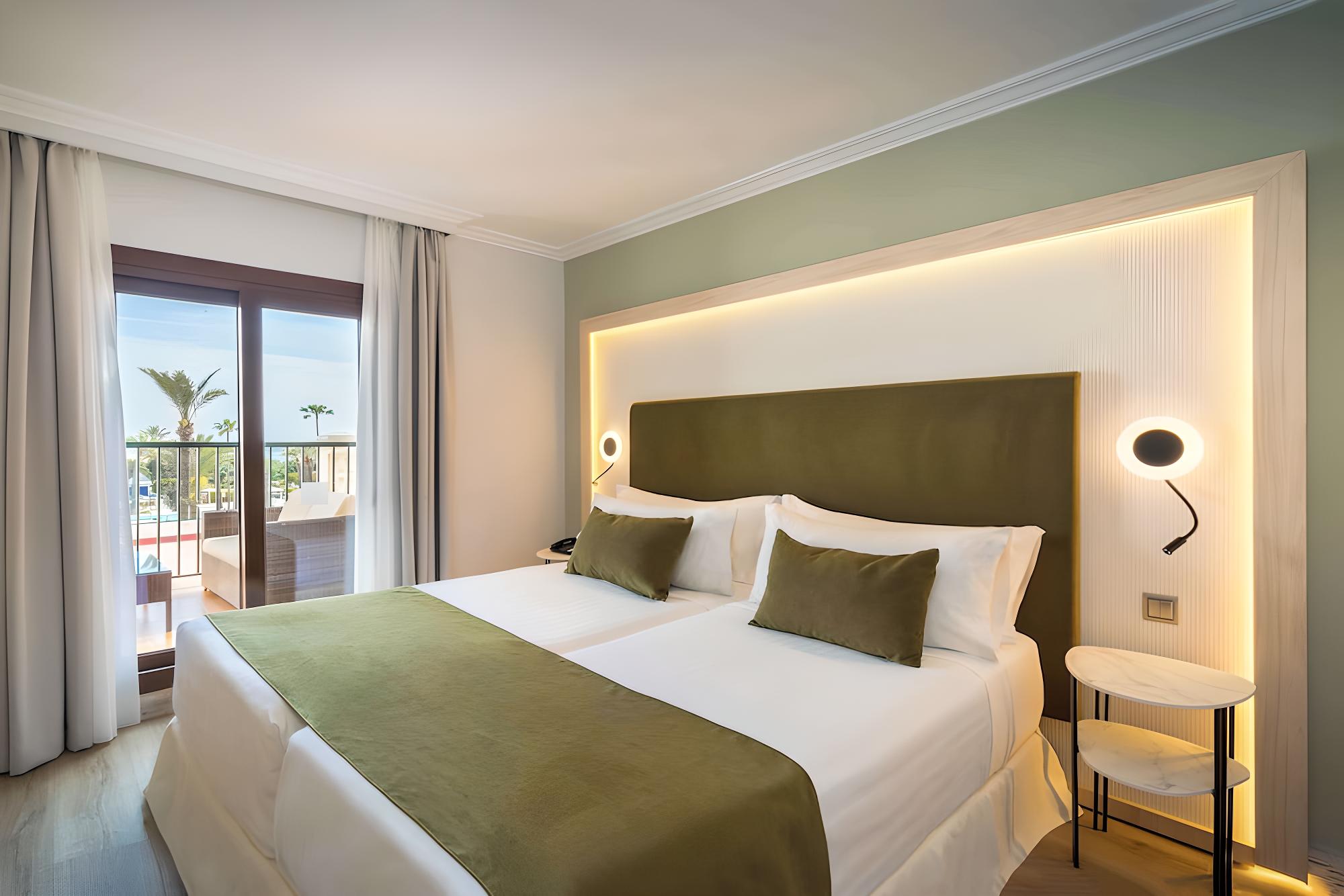 Experience comfort in our stylish, serene hotel rooms.