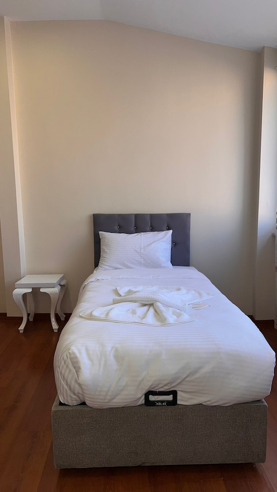 Standard Quadruple Room, City View photo 2