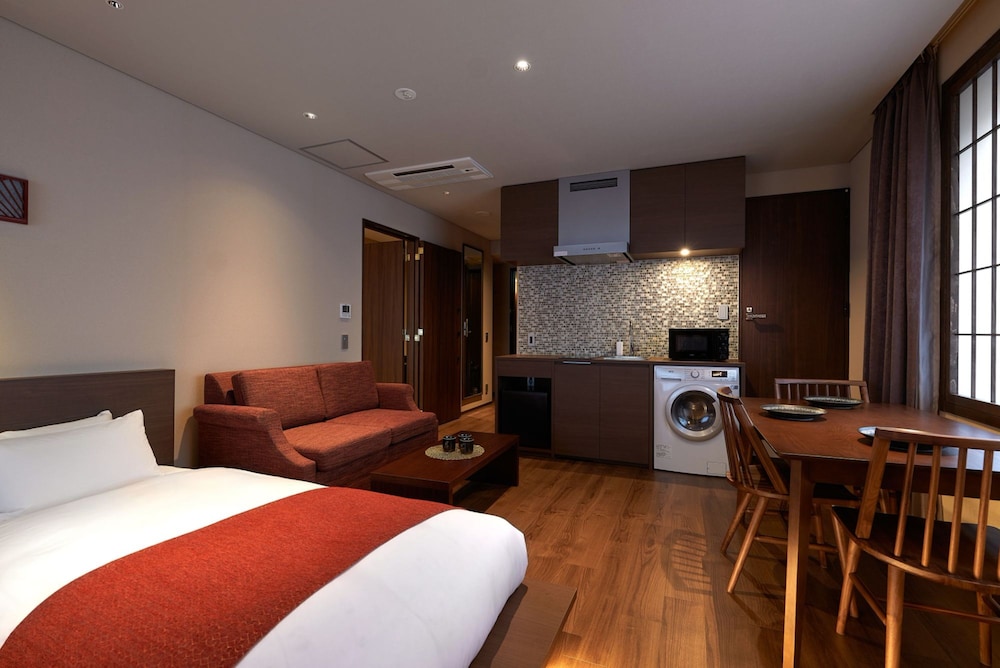 Deluxe Triple Room, Multiple Beds, Non Smoking, Kitchen - Photo 1
