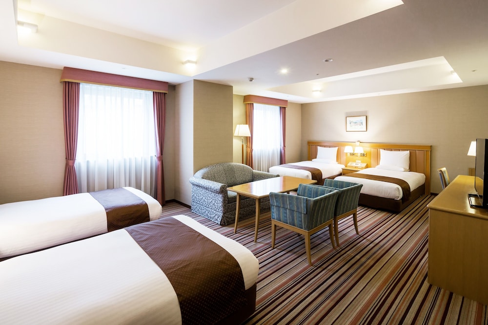 Quadruple Room, Non Smoking (Eco Plan - No Cleaning Service) photo 1