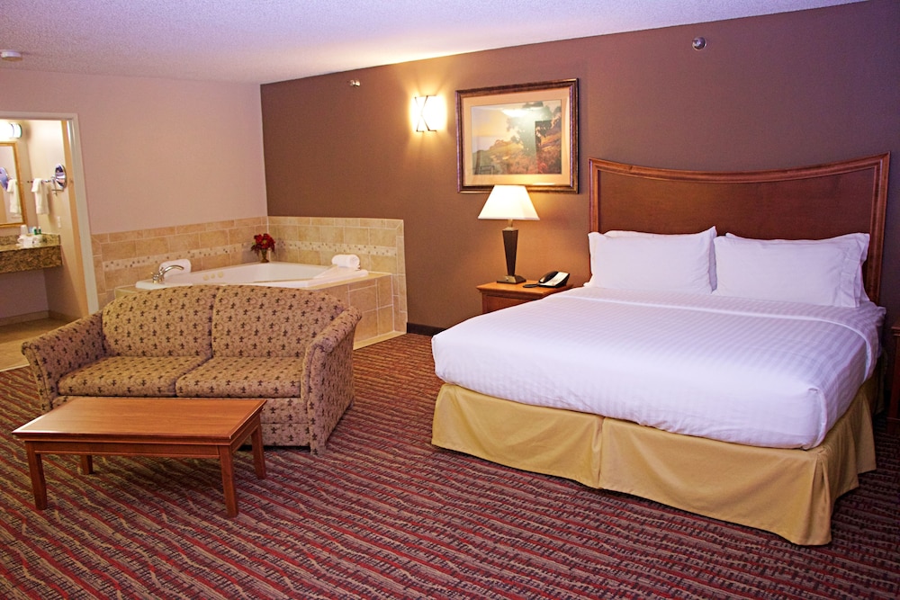 Suite, 1 King Bed With Sofa Bed, Jetted Tub - Photo 1