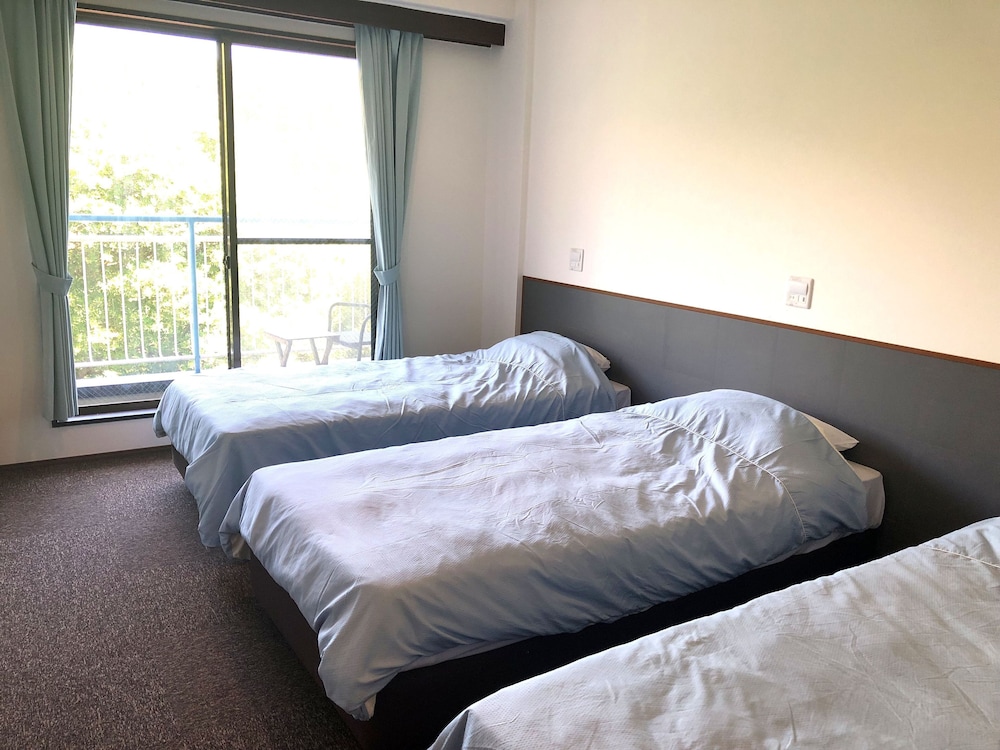 Connecting room [3 beds + 3 futons, 4th floor, No elevator, Mountain side] Non-smoking photo 2