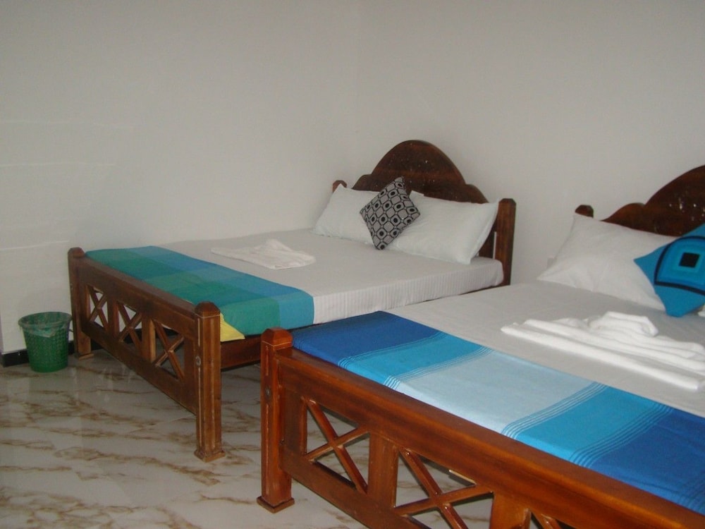Deluxe Twin Room, 3 Bedrooms, Garden View photo 1