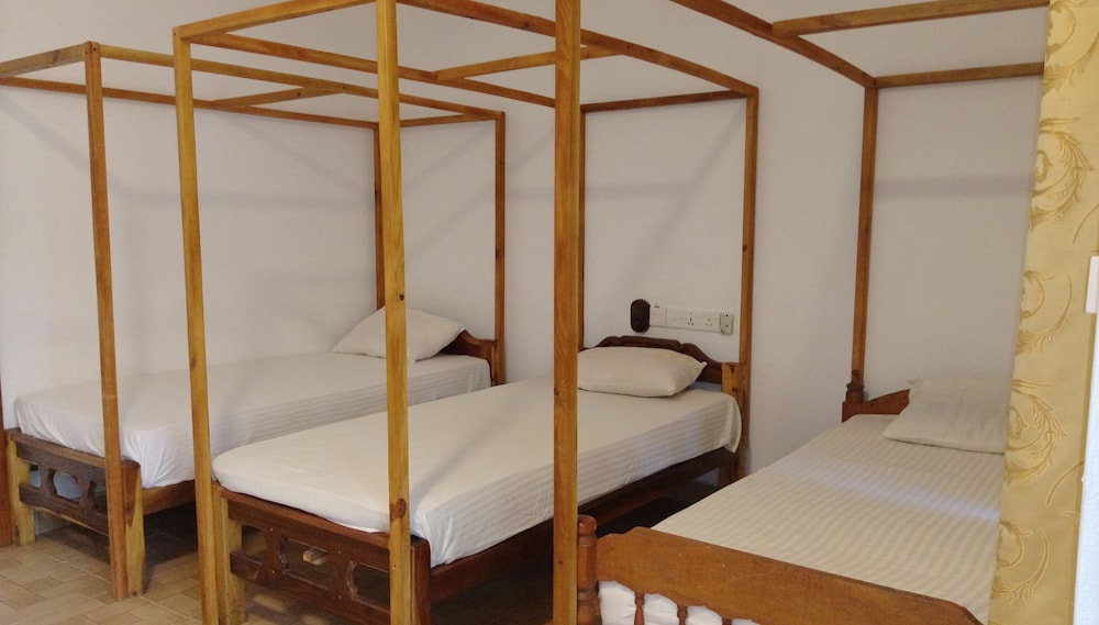Deluxe Triple Room, Garden View photo 1