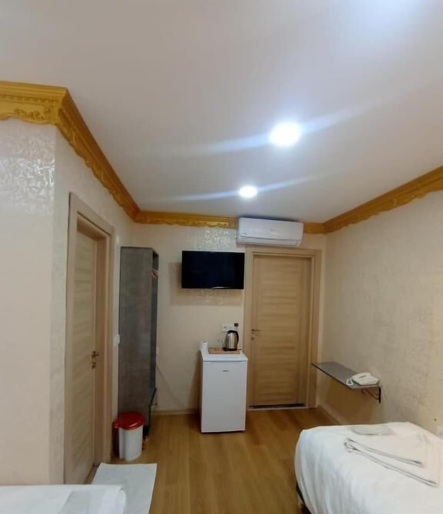 Grand Triple Room photo 3