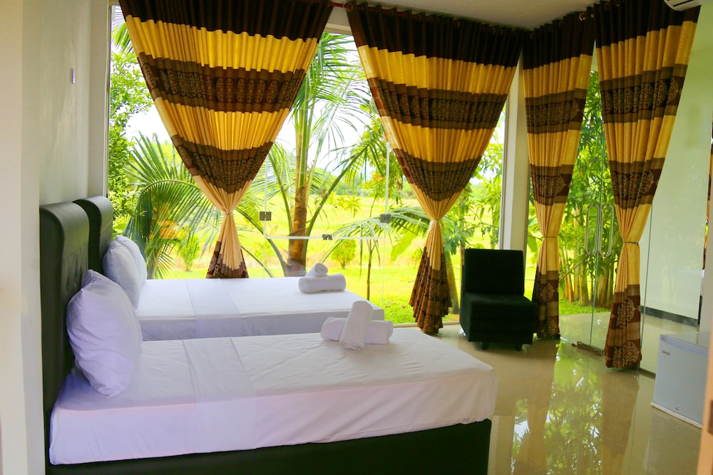 Deluxe Triple Room, 1 Bedroom, Balcony, Garden View photo 1
