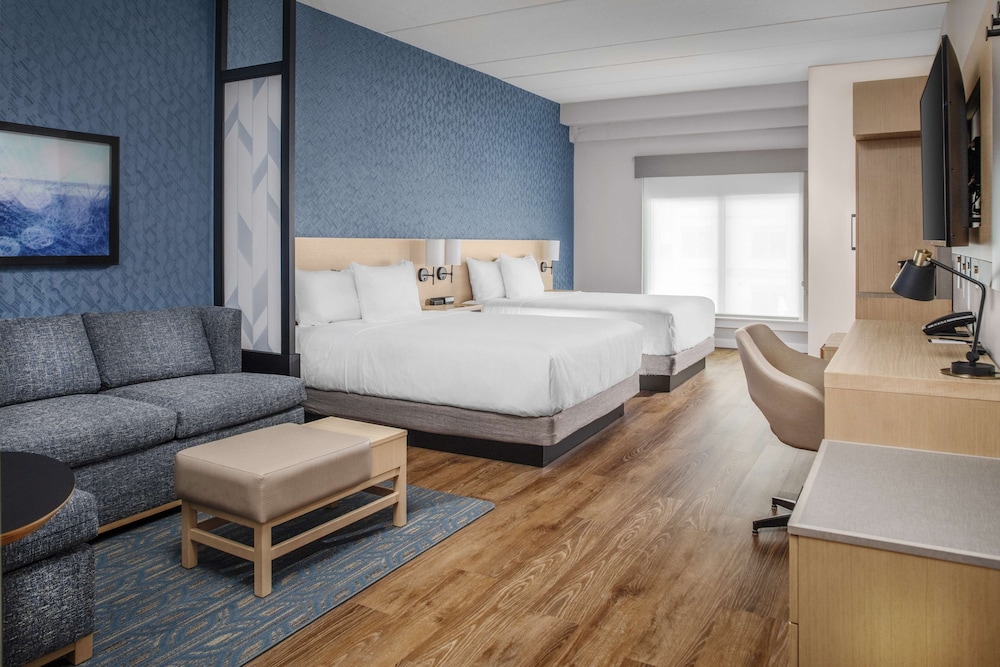 Room, Pool View (2 Queen Beds, Sofa Bed, Non-Balcony) - Photo 1