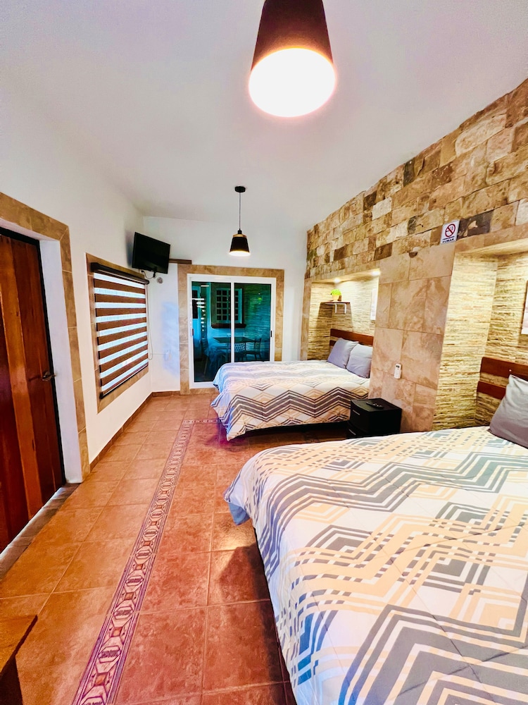 Deluxe Duplex, 2 Queen Beds, Non Smoking, Garden View photo 1