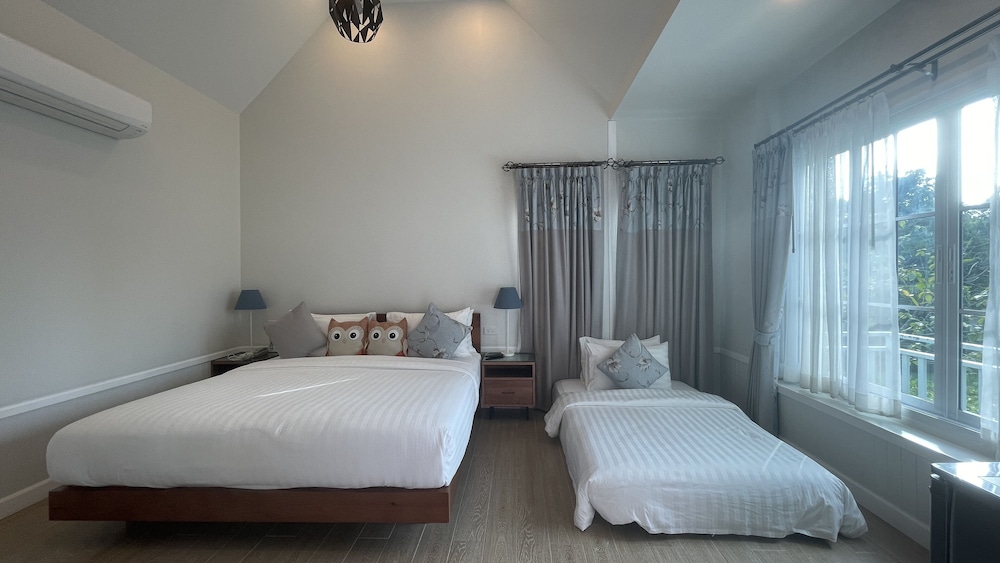 Deluxe Triple Room, Balcony - Photo 1
