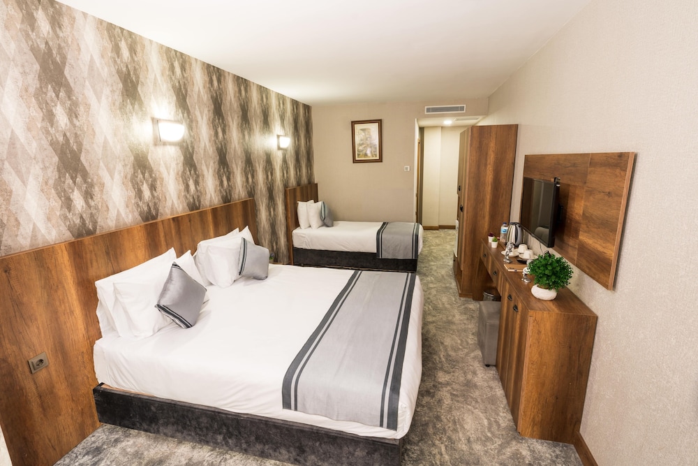 Deluxe Triple Room - Photo 1