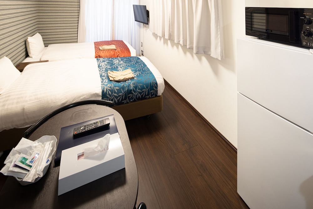 Standard Twin Room - Photo 8