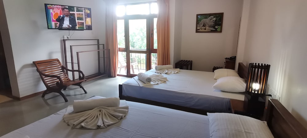 Deluxe Quadruple Room, Garden View, Corner photo 2