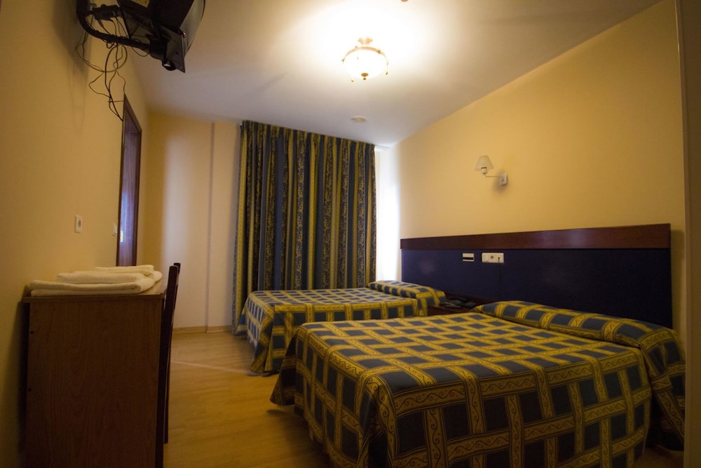 Triple Room - Photo 1