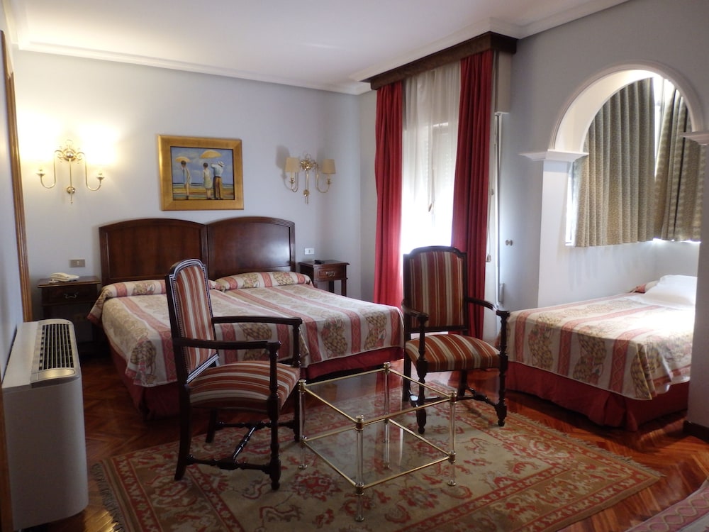 Triple Room - Photo 1