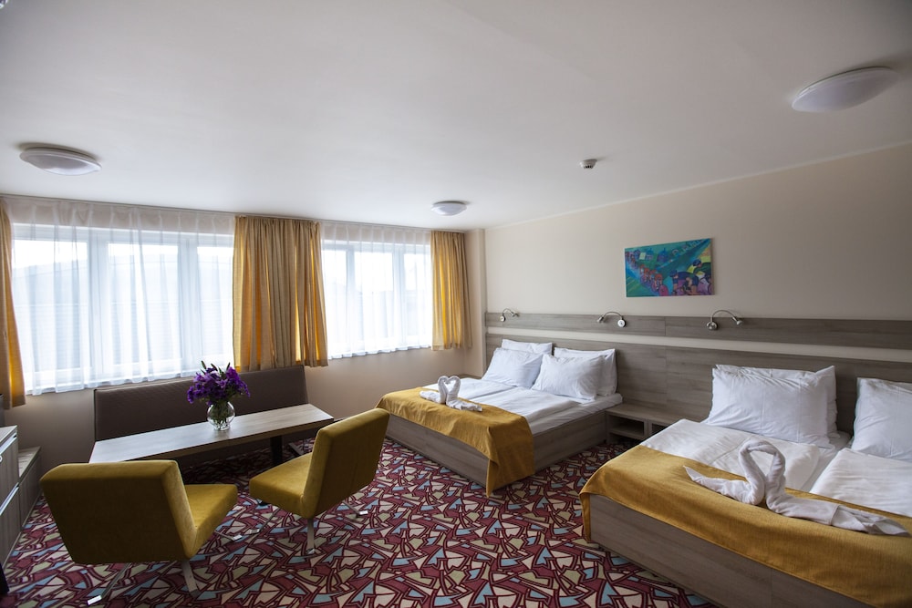Deluxe Quadruple Room, 2 Queen Beds