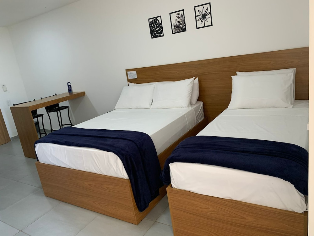 Basic Triple Room, Multiple Beds, City View - Photo 2