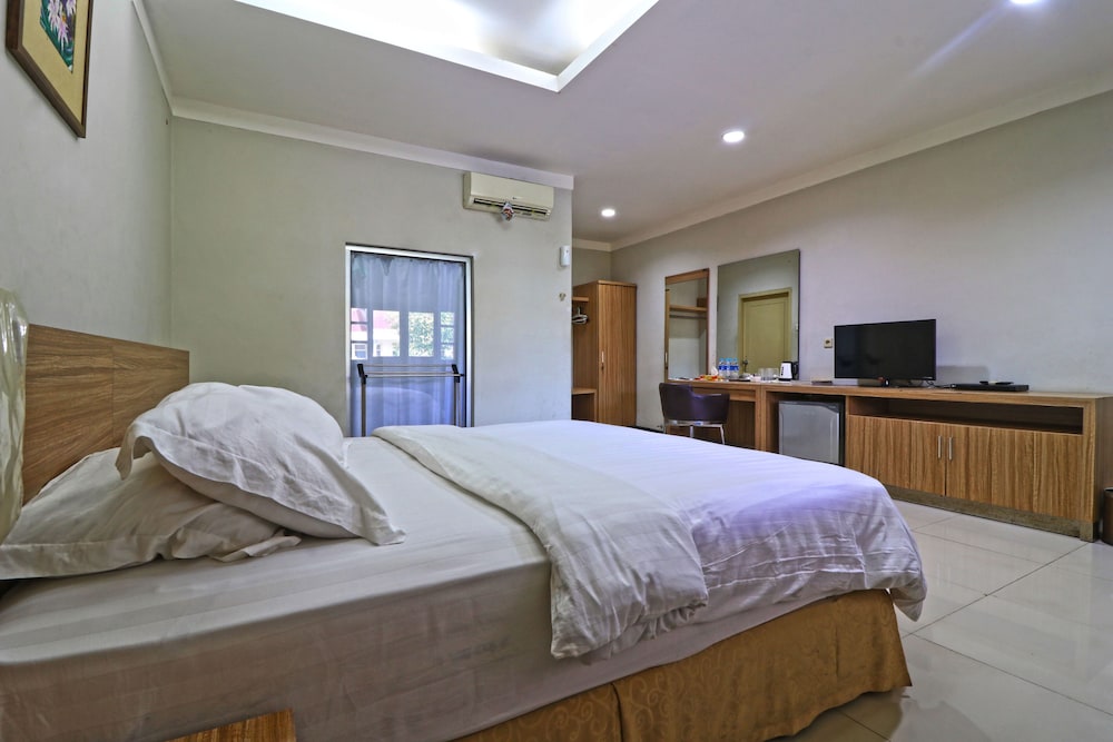 Deluxe Room - Photo 6