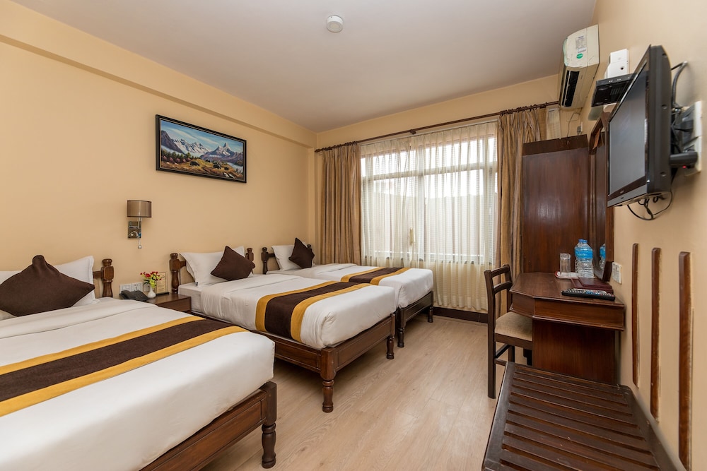 Deluxe Triple Room - Photo 13