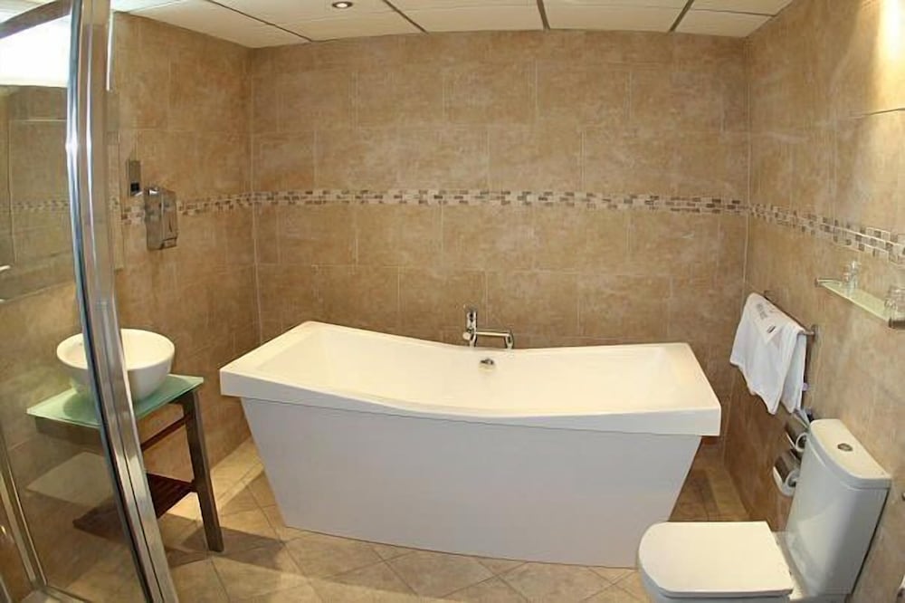 Deluxe Quadruple Room - Photo 7