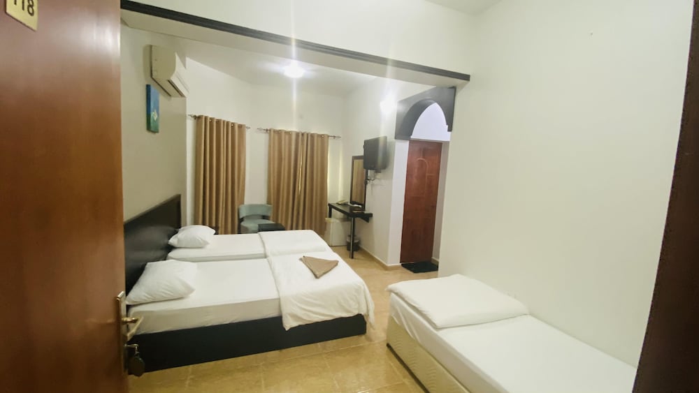 Economy Triple Room photo 1