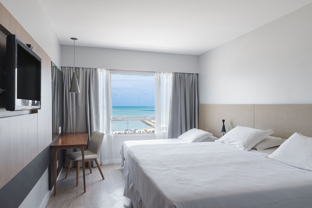 Superior Casal com Cama Extra Frente Mar - Photo 1
