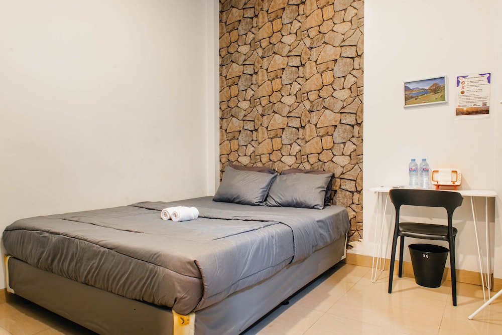 Deluxe Room - Photo 16