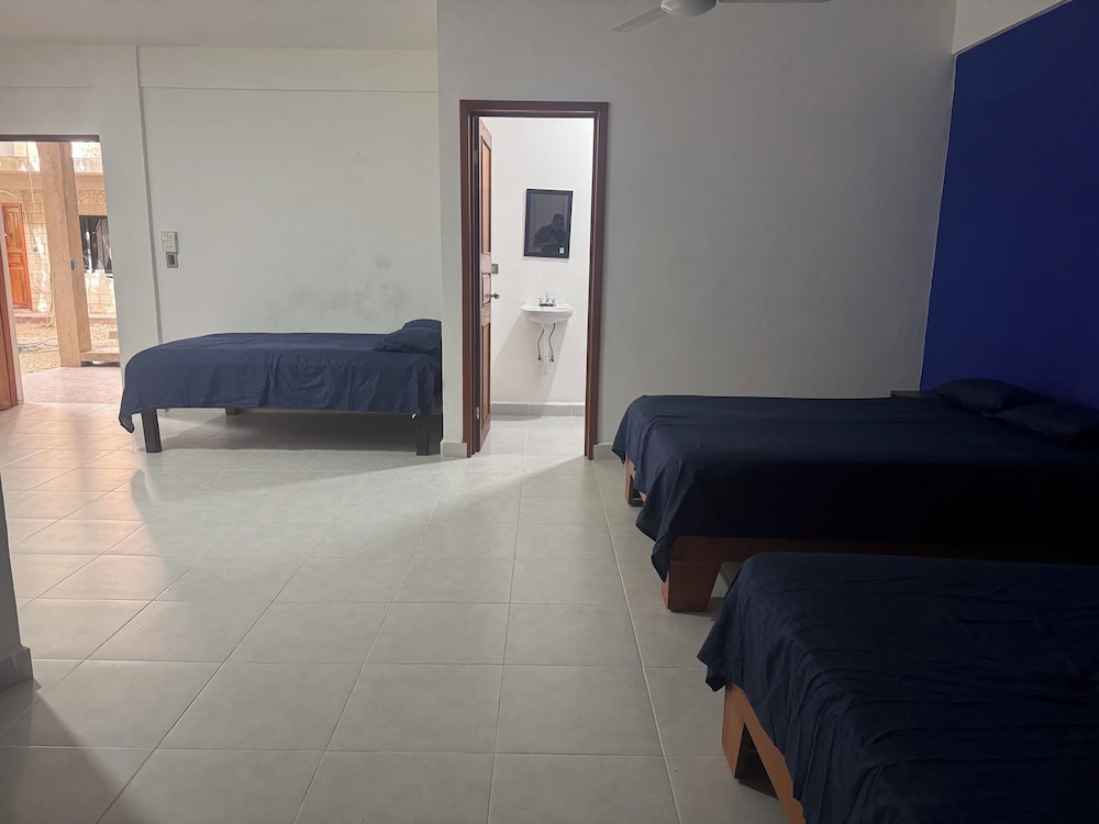 Deluxe Triple Room, Multiple Beds, Private Bathroom, Courtyard View