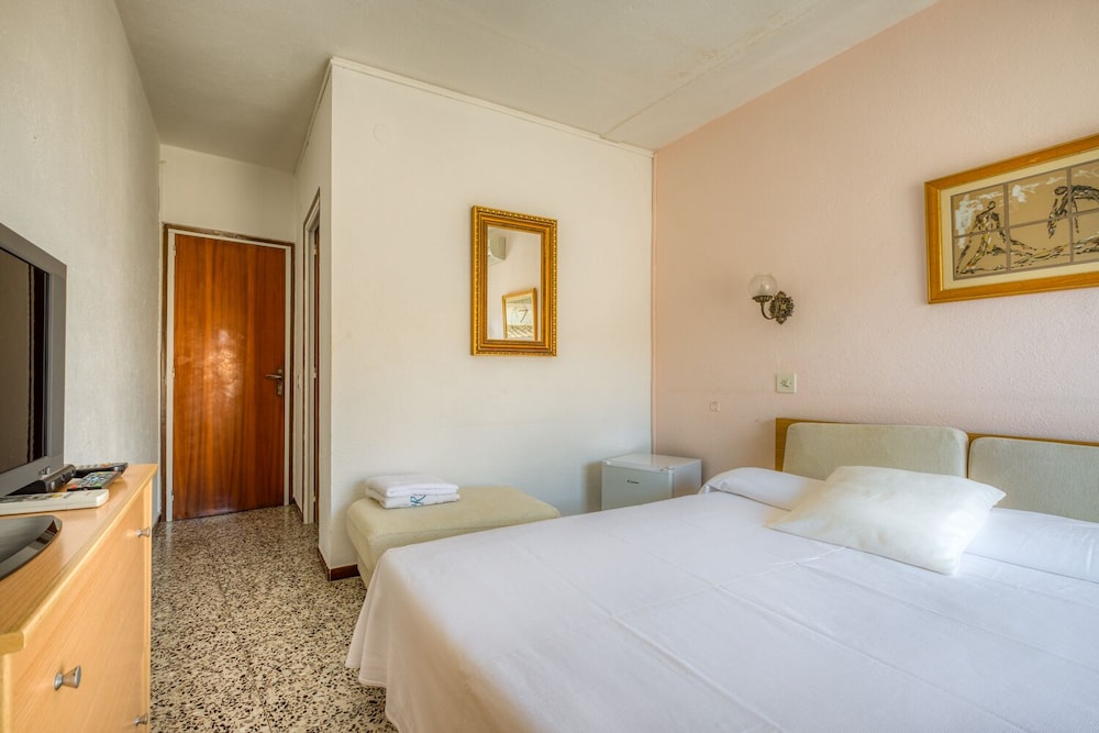 Habitación Doble Estándar o con Dos Camas Individuales.