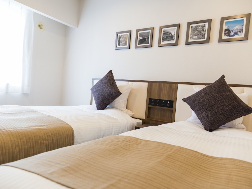 Twin Room, Smoking (Eco Plan - No Cleaning Service) photo 3