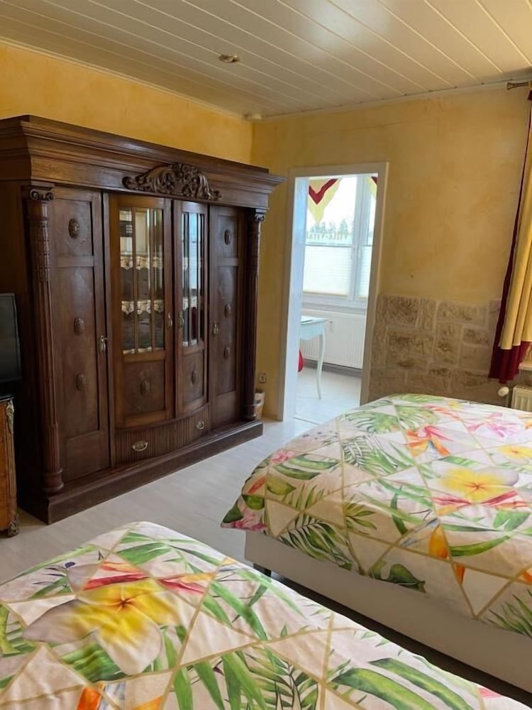 Deluxe Quadruple Room, 2 Queen Beds photo 2