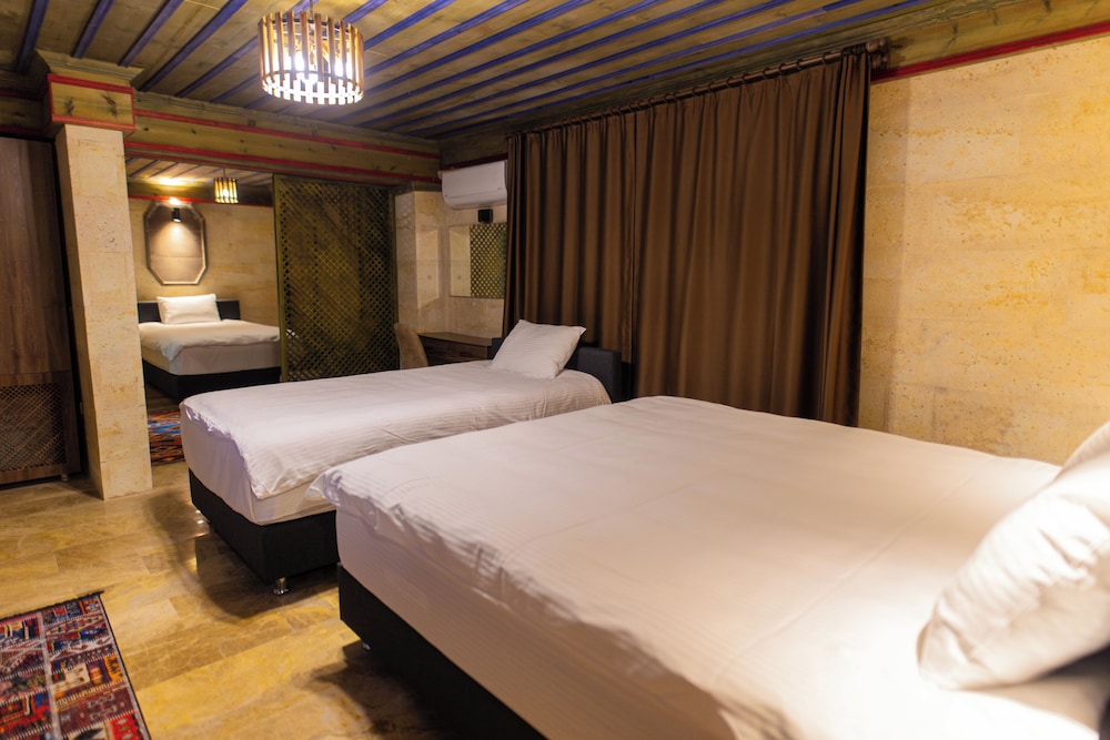 Family Triple Room, Multiple Beds, Courtyard View photo 1