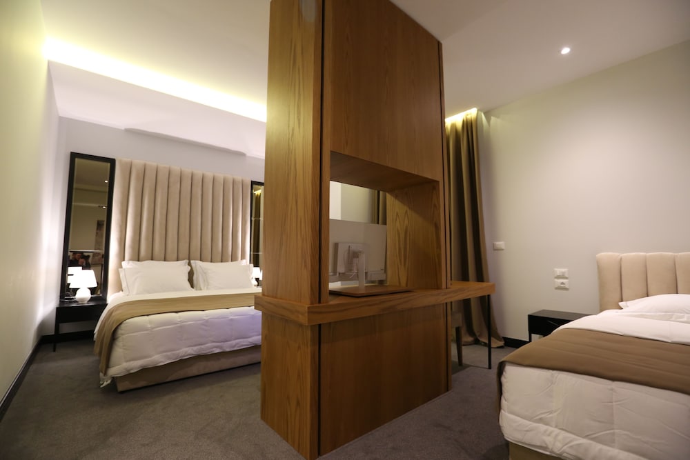 Superior triple room with one double bed and one single bed
