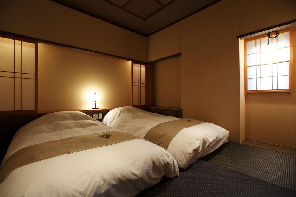 Japanese Western Style Quadruple Room B, Open-air Hot Spring Bath - Photo 4