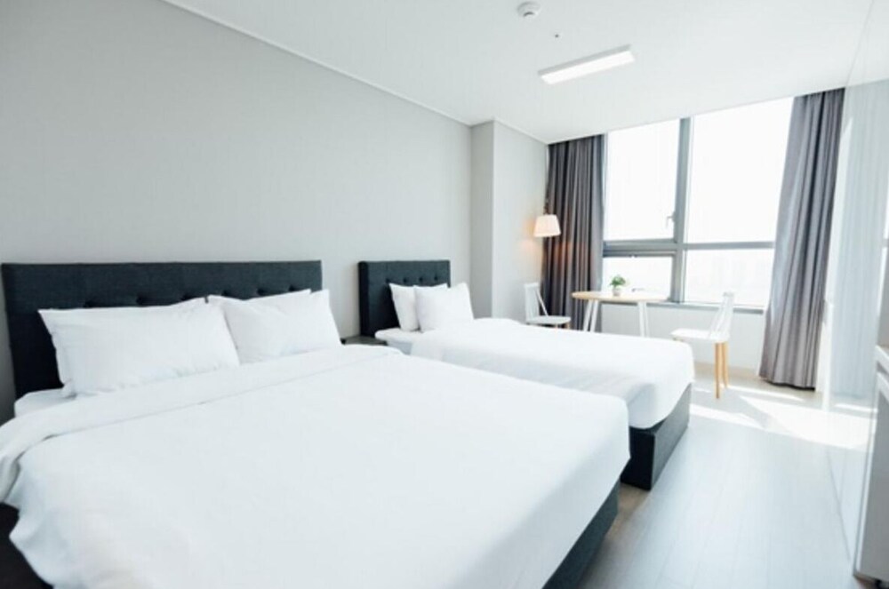 Family Twin Room - Photo 16