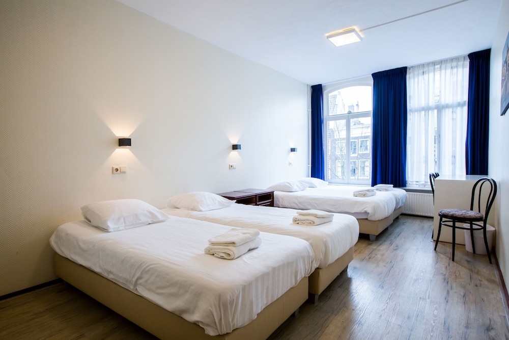 Quadruple Room (3 person use) photo 2