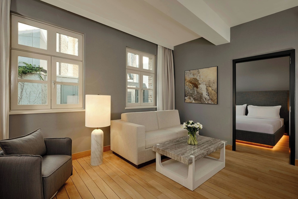 Suite, 1 King Bed with Sofa bed photo 1
