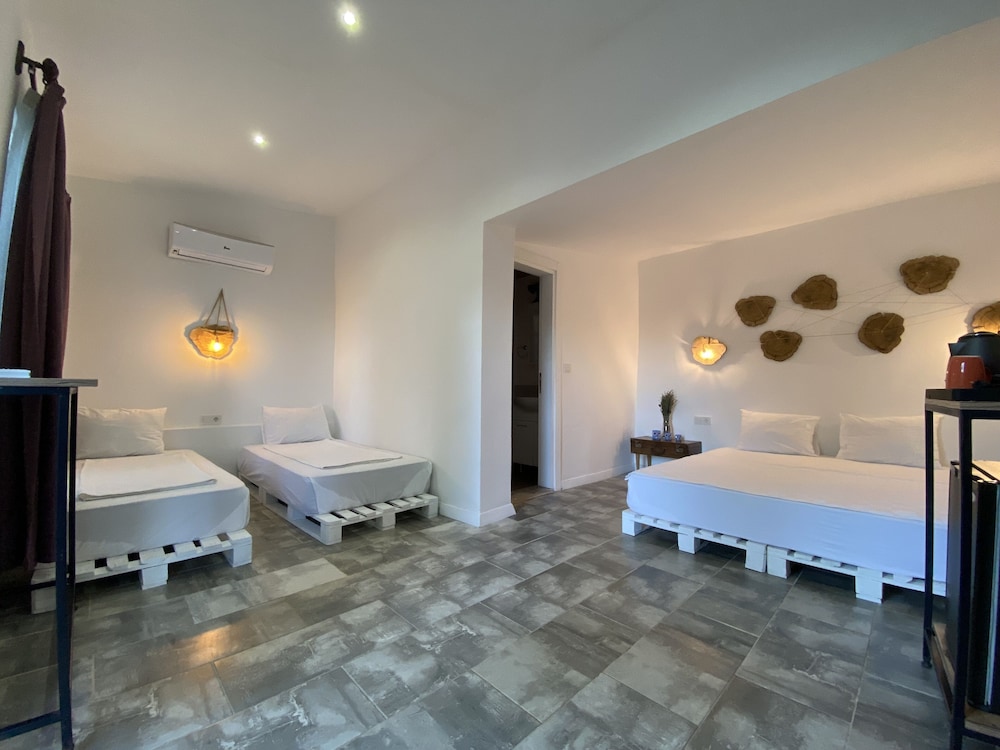 Family Quadruple Room, Multiple Beds, Garden View photo 1